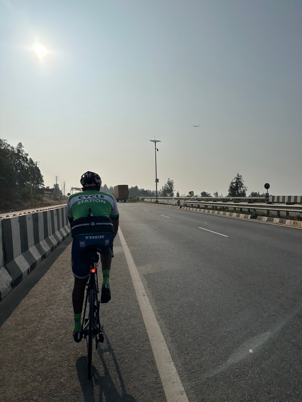 Cyclist and a&nbsp;plane